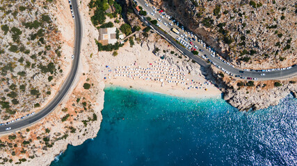 Aerial view of Kaputas beach between Kas and Kalkan, Turkey . Drone view of beach with beautiful,clear turquoise waters of the Mediterranean Sea. Popular and famous place for tourists