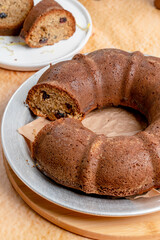 Whole wheat flour cake, moist and flavorful tangy lemon, and dried cranberry cake concept food photo selective focus