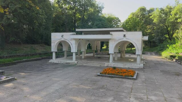 Mineral water hot spring Momina salza (Maiden&rsquo;s Tear) where people come to fill up water. Calm autumn morning. Town of Hisarya, Bulgaria