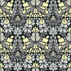 a noiseless pattern with plant patterns in a gray yellow and black color scheme
