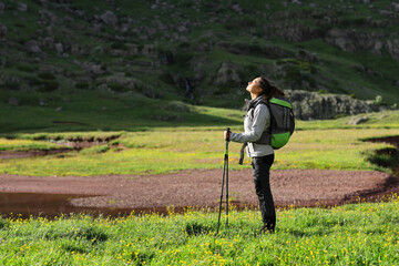 Hiker breathing fresh air in a riverside