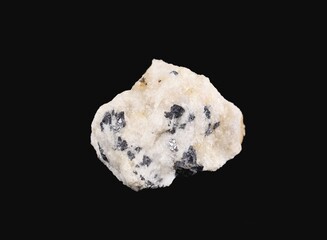 Raw Moonstone gemstone on black background.