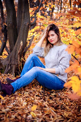 Beautiful  woman in autumn park