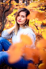 Beautiful  woman in autumn park