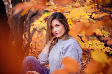 Beautiful  woman in autumn park