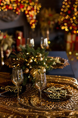 Beautiful table setting with Christmas decorations in living room