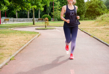 Unrecognizable woman tries to get fit by running