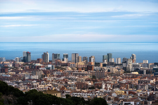 Aerial view of modern office buildings in the Diagonal Mar and Poble Nou area in the city of Barcelona with the Mediterranean Sea in the background