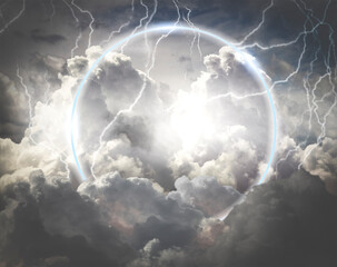 luminous circle on the background of thunderclouds. copyspace. mockup.