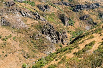 Rock formations in a mountain gorge, autumn.