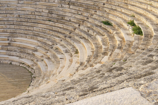Ancient antique amphitheater in Turkey. The ancient Greek architecture of cities and buildings is the culture of the development of civilization. History, science, antiquity concept.