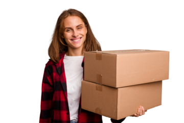 Young caucasian woman moving while picking up a box full of things isolated happy, smiling and cheerful.