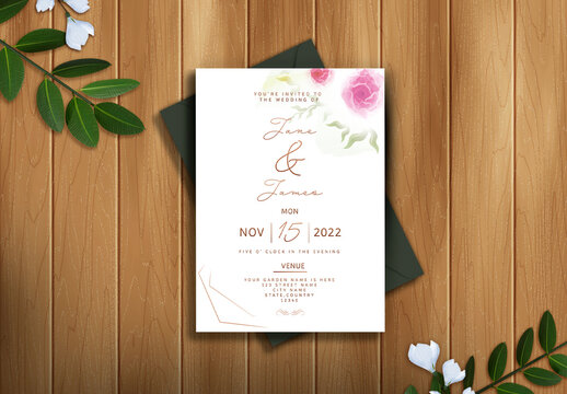 Wedding watercolour Invitation card  decorated with leaves on wooden texture background
