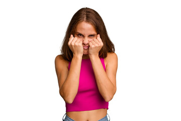 Young caucasian woman isolated throwing a punch, anger, fighting due to an argument, boxing.