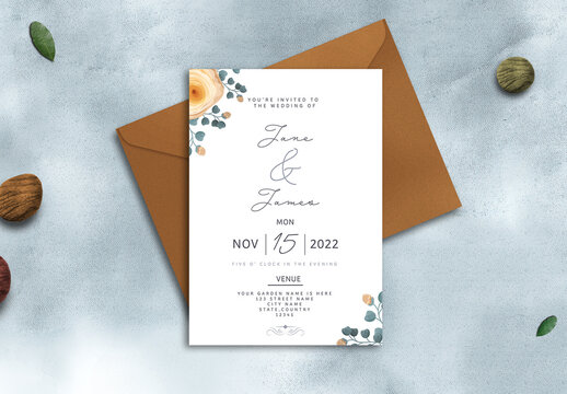 Wedding Invitation or stationery mockup with envelope. Top view template with decorative elements.