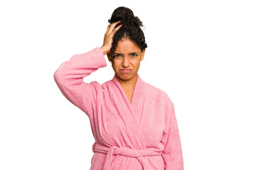 Young brazilian woman wearing a pink bathrobe isolated being shocked, she has remembered important meeting.