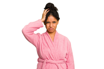 Young brazilian woman wearing a pink bathrobe isolated being shocked, she has remembered important meeting.