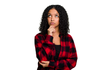 Young cute brazilian woman isolated looking sideways with doubtful and skeptical expression.