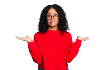 Young cute brazilian woman isolated confused and doubtful shrugging shoulders to hold a copy space.