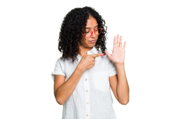 Young cute brazilian woman isolated smiling cheerful showing number five with fingers.