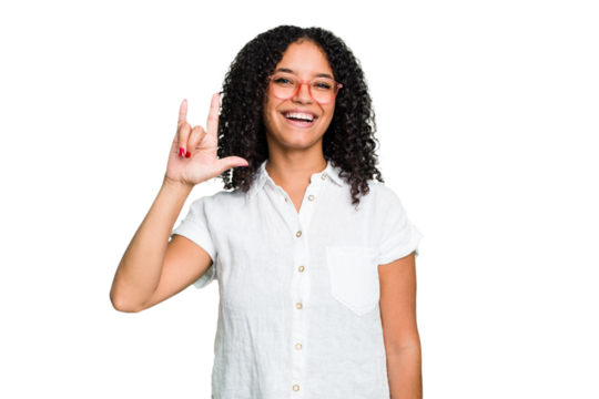Young cute brazilian woman isolated showing a horns gesture as a revolution concept.