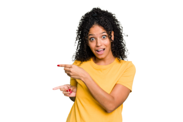 Young cute brazilian woman isolated excited pointing with forefingers away.