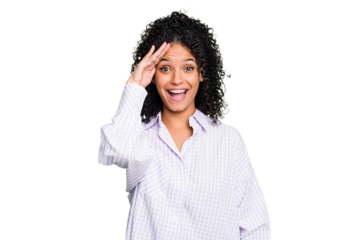 Young cute brazilian woman isolated shouts loud, keeps eyes opened and hands tense.