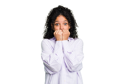 Young cute brazilian woman isolated biting fingernails, nervous and very anxious.