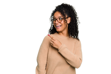 Young cute brazilian woman isolated looks aside smiling, cheerful and pleasant.