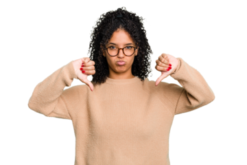 Young cute brazilian woman isolated showing a dislike gesture, thumbs down. Disagreement concept.