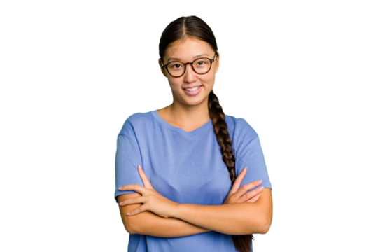 Young Asian woman isolated who feels confident, crossing arms with determination.