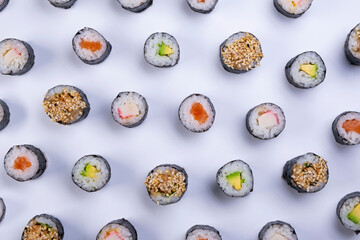  sushi maki rolls on white background © Pavlo