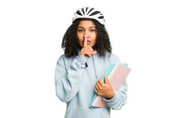 Young african american student woman wearing a helmet bike isolated keeping a secret or asking for silence.