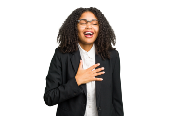 Young african american business woman isolated laughs out loudly keeping hand on chest.