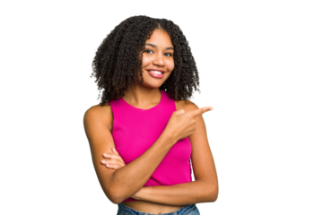 Young african american woman isolated smiling cheerfully pointing with forefinger away.