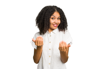 Young african american woman isolated pointing with finger at you as if inviting come closer.