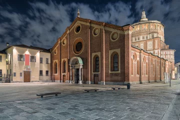 Wandcirkels tuinposter Milan city at night. Basilica Santa Maria delle Grazie famous for hosting Leonardo da Vinci masterpiece "The Last Supper" and to the left the Museo  © AleMasche72