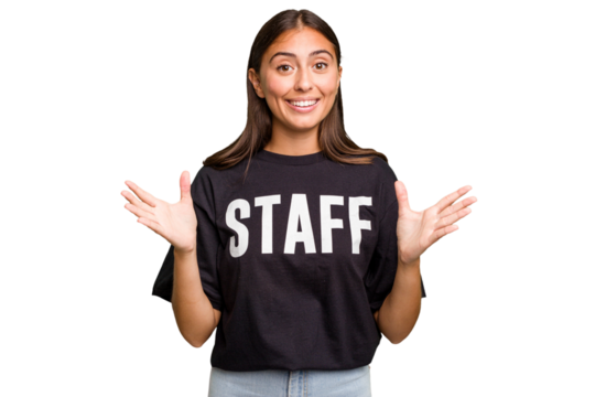 Young caucasian staff woman isolated receiving a pleasant surprise, excited and raising hands.