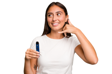 Young caucasian woman holding a electronic cigarette showing a mobile phone call gesture with fingers.