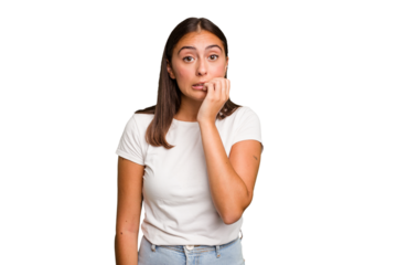 Young cute caucasian woman isolated biting fingernails, nervous and very anxious.