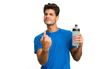 Young sport caucasian man holding a bottle of water isolated pointing with finger at you as if...