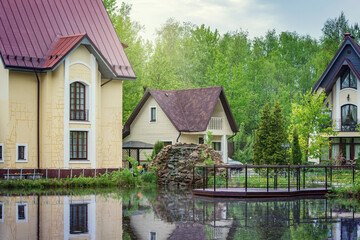 Fototapeta na wymiar Private luxury houses by the lake in the forest,