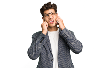 Young caucasian handsome man isolated covering ears with fingers, stressed and desperate by a loudly ambient.