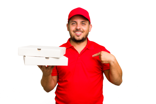 Pizza delivery caucasian man with work uniform picking up pizza boxes isolated person pointing by hand to a shirt copy space, proud and confident