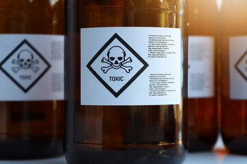 The toxic chemical symbol on the bottle