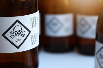The toxic chemical symbol on the bottle - obrazy, fototapety, plakaty