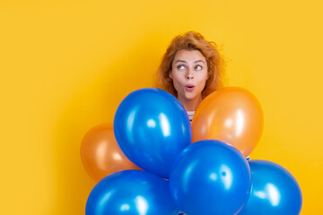 Fototapeta na wymiar happy birthday girl hold balloons in studio. surprised girl with balloon for birthday party