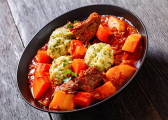 Beef Stew with Dumplings in bowl, top view