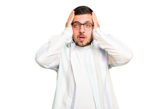 Young caucasian man isolated being shocked, she has remembered important meeting.