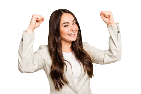 Young caucasian woman isolated on green chroma background cheering carefree and excited. Victory concept.